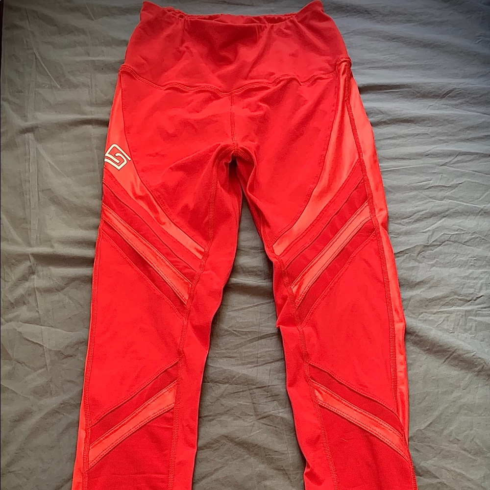 Women’s Red mesh leggings. Small